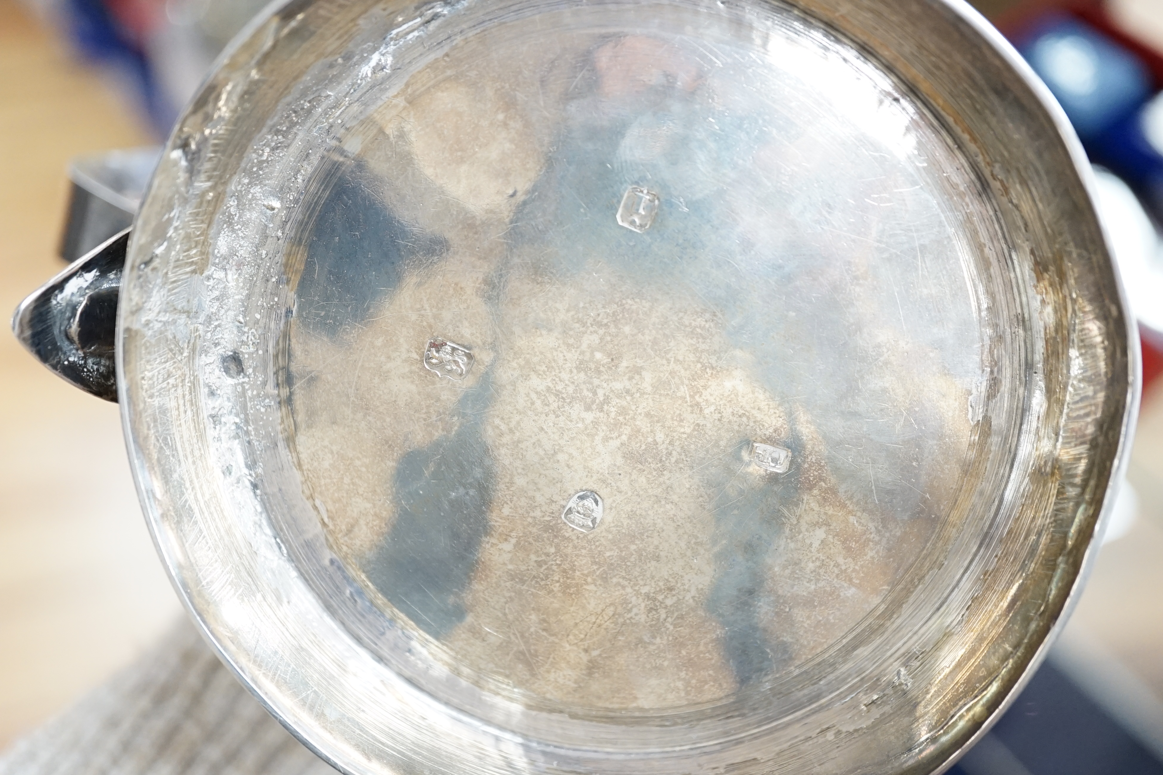 A George III silver tankard, with banded girdle, makers mark on lid and base differ?, London, 1784, height 17.5cm, 17.6oz. (a.f.)
